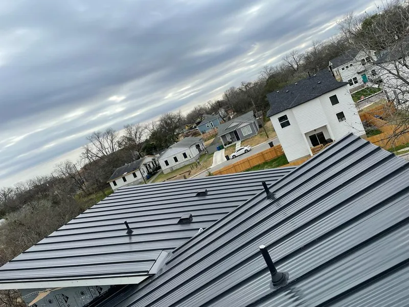 Standing seam metal roof panels with vents for Skylight Repair in Marion